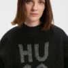 Strickpullover mit funkelndem, übereinanderliegendem Logo