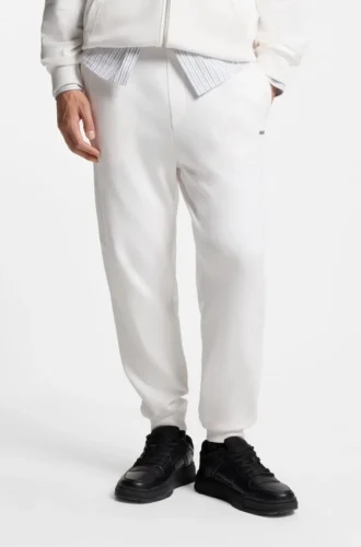 Sweathose mit Bündchen aus Baumwollfrottee mit Logo-Print