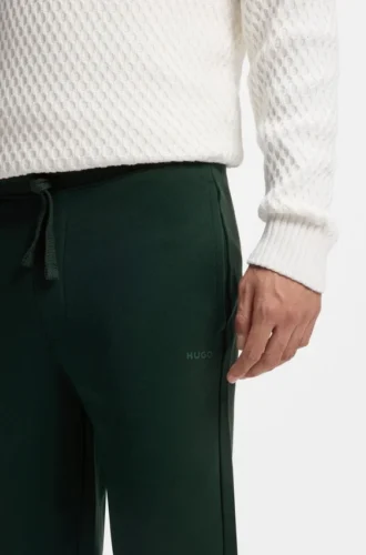 Sweathose mit Bündchen aus Baumwollfrottee mit Logo-Print
