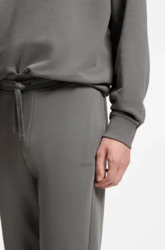 Sweathose mit Bündchen aus Baumwollfrottee mit Logo-Print