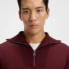 Sweatshirt aus aufgerauter Baumwolle mit geripptem Reißverschlusskragen Sweatshirt aus aufgerauter Baumwolle mit geripptem Reißverschlusskragen