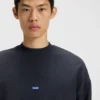 Sweatshirt aus Baumwollfrottee mit blauem Logo-Aufnäher