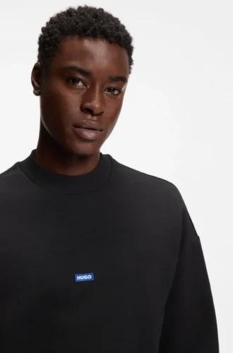 Sweatshirt aus Baumwollfrottee mit blauem Logo-Aufnäher