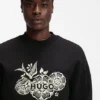 Sweatshirt aus Baumwollfrottee mit gesticktem Motiv