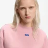 Sweatshirt aus Baumwollfrottee mit Logo-Aufnäher