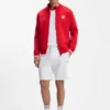 Sweatshirt aus Baumwollmischung mit Reißverschluss und Aufnäher in den Farben der Landesflagge