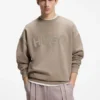Sweatshirt in Oversize-Passform aus Baumwollfrottee mit farblich abgestimmtem Logo