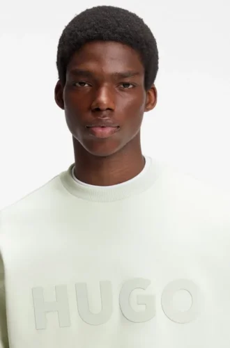 Sweatshirt in Oversize-Passform aus Baumwollfrottee mit farblich abgestimmtem Logo