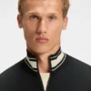 Sweatshirt mit Reißverschluss und Streifendetails aus einer Baumwollmischung Sweatshirt mit Reißverschluss und Streifendetails aus einer Baumwollmischung