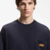 T-Shirt aus Baumwolle in lockerer Passform mit Logo-Patch aus Wildleder T-Shirt aus Baumwolle in lockerer Passform mit Logo-Patch aus Wildleder