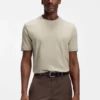 T-Shirt aus Baumwolljersey mit charakteristischen gestreiften Ärmelbündchen T-Shirt aus Baumwolljersey mit charakteristischen gestreiften Ärmelbündchen