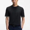 T-Shirt aus Baumwolljersey mit charakteristischen gestreiften Ärmelbündchen T-Shirt aus Baumwolljersey mit charakteristischen gestreiften Ärmelbündchen
