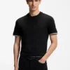 T-Shirt aus Baumwolljersey mit charakteristischen gestreiften Ärmelbündchen T-Shirt aus Baumwolljersey mit charakteristischen gestreiften Ärmelbündchen