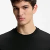 T-Shirt aus Baumwolljersey mit charakteristischen gestreiften Ärmelbündchen T-Shirt aus Baumwolljersey mit charakteristischen gestreiften Ärmelbündchen