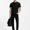 T-Shirt aus Baumwolljersey mit charakteristischen gestreiften Ärmelbündchen T-Shirt aus Baumwolljersey mit charakteristischen gestreiften Ärmelbündchen