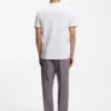 T-Shirt aus Baumwolljersey mit charakteristischen gestreiften Ärmelbündchen T-Shirt aus Baumwolljersey mit charakteristischen gestreiften Ärmelbündchen