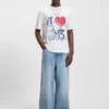 T-Shirt aus Baumwolljersey mit Happy HUGO-Motiv