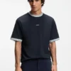 T-Shirt in Relaxed-Fit aus Baumwolle mit gestreiften Bündchen