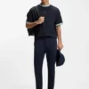T-Shirt in Relaxed-Fit aus Baumwolle mit gestreiften Bündchen