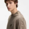 T-Shirt in Relaxed-Fit aus Interlock-Baumwolle mit Stickerei an den Schultern T-Shirt in Relaxed-Fit aus Interlock-Baumwolle mit Stickerei an den Schultern