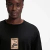 T-Shirt mit gesticktem Aufnäher aus Baumwollfrottee