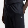 Trainingshose aus Baumwollfrottee mit charakteristischen Streifen und Logo