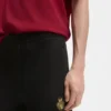 Trainingshose aus Baumwollfrottee mit Logo-Motiv zum Jahr des Pferdes