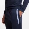Trainingshose aus Baumwollfrottee mit Logo und Streifen