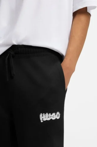 Trainingshose mit Logo-Print aus Baumwollfrottee