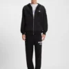 Trainingshose mit Logo-Print aus Baumwollfrottee