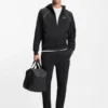 Trainingshose mit Paspeldetails aus Baumwollmischung Trainingshose mit Paspeldetails aus Baumwollmischung