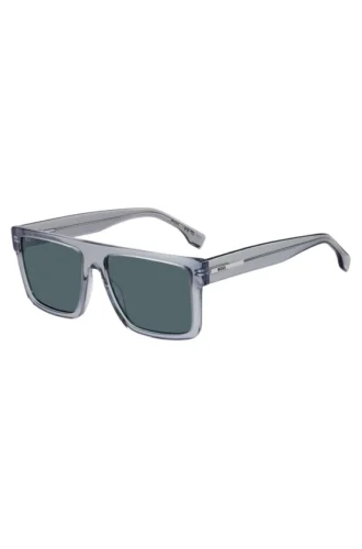 Transparent-blaue Sonnenbrille mit Logo-Plakette