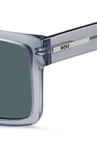 Transparent-blaue Sonnenbrille mit Logo-Plakette