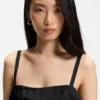 Trägerkleid mit lasergeschnittenen Motiven
