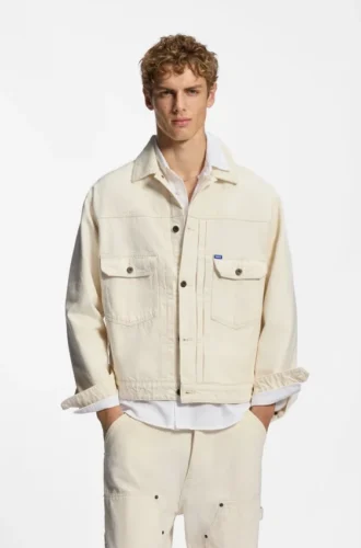Truckerjacke in lockerer Passform aus ecrufarbenem Denim