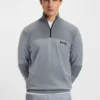 Wasserabweisender Pullover mit Reißverschluss aus einer Baumwollmischung Wasserabweisender Pullover mit Reißverschluss aus einer Baumwollmischung