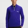 Wasserabweisender Pullover mit Reißverschlusskragen aus einer Baumwollmischung Wasserabweisender Pullover mit Reißverschlusskragen aus einer Baumwollmischung