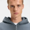 Zweilagiger Kapuzenpullover mit Reißverschluss aus Baumwollmischung Zweilagiger Kapuzenpullover mit Reißverschluss aus Baumwollmischung